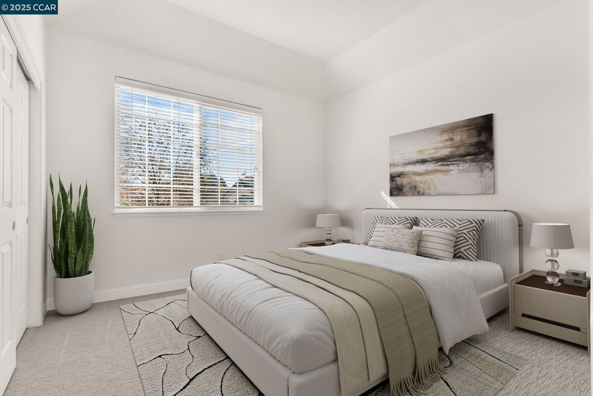 440 Canyon Woods Place, Unit C San Ramon, CA 94582 - Photo 9 of 17 a bedroom with a bed a couch and a window