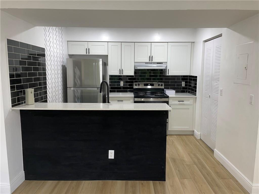 1223 Southwest 46th Avenue, Unit 108 Pompano Beach, FL 33069 - Photo 3 of 11 Photo 3