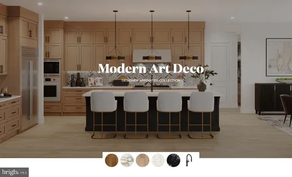 a kitchen with a dining table chairs and white cabinets