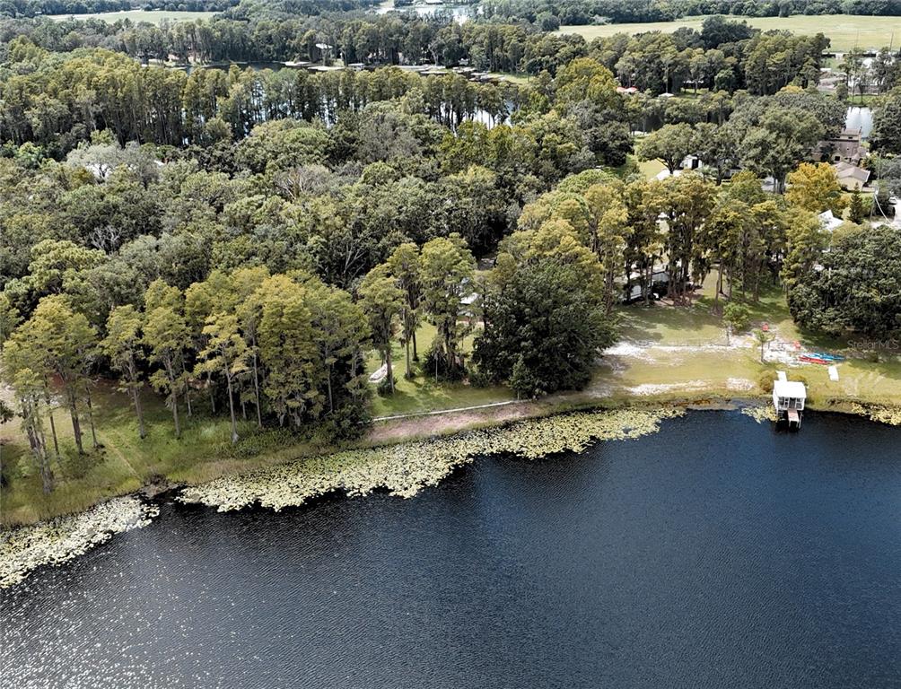 Rogers Road Odessa, FL 33556 - Photo 5 of 14 a view of a lake with lots of residential buildings
