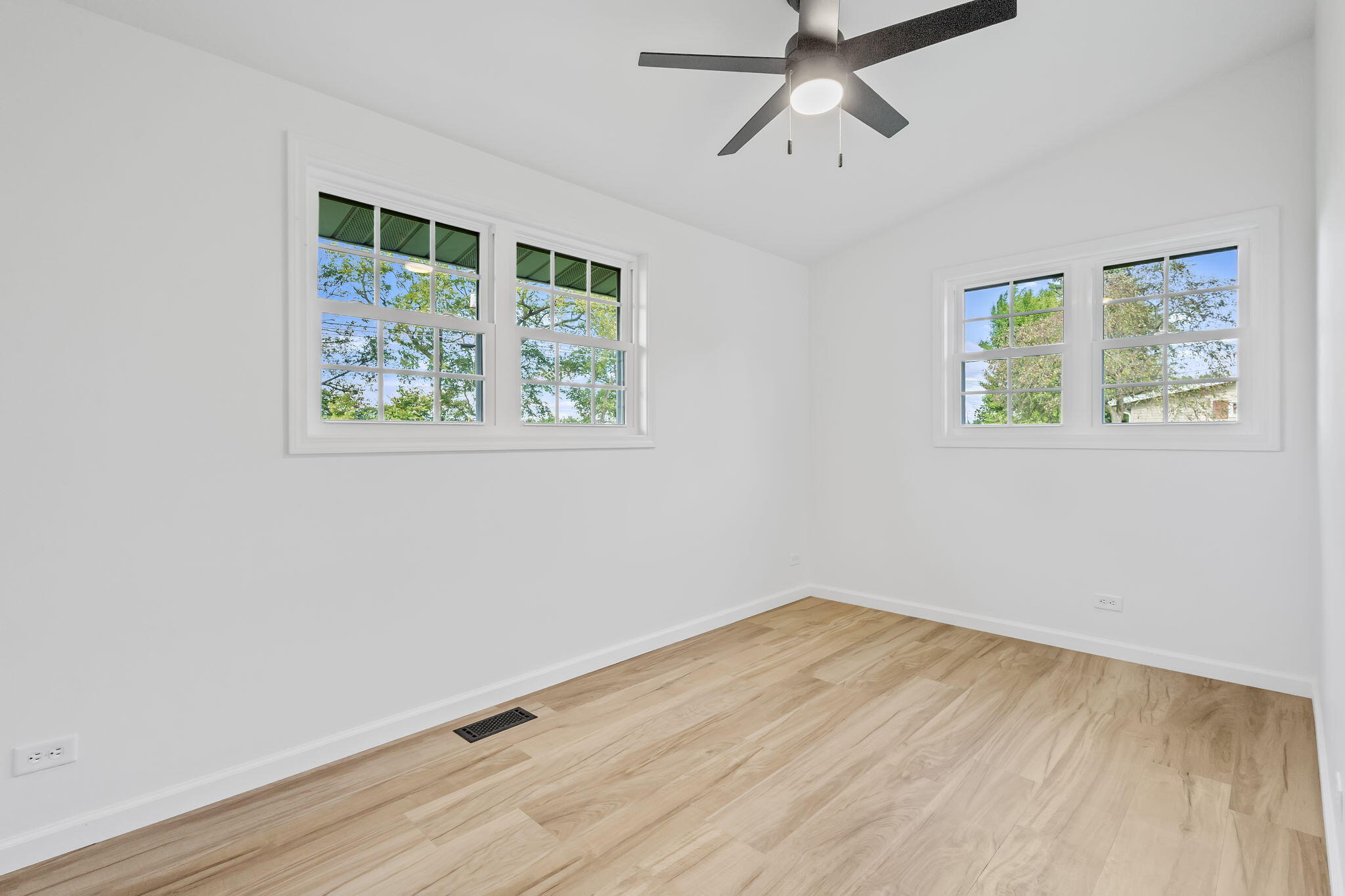 229 West Wood Road Rensselaer, IN 47978 - Photo 18 of 23 a view of room with wooden floor and window