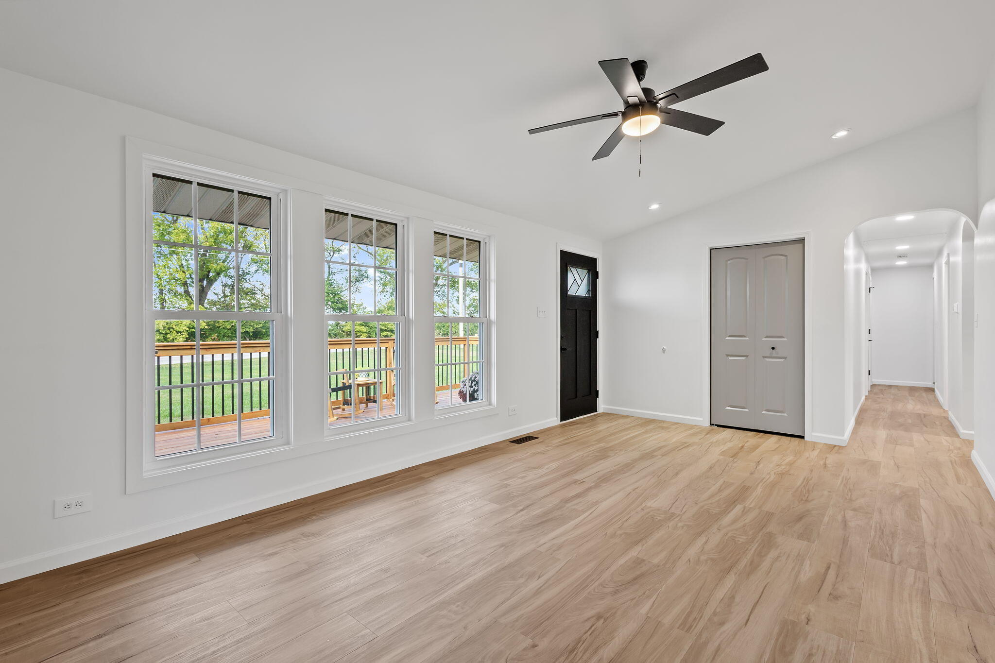 229 West Wood Road Rensselaer, IN 47978 - Photo 5 of 23 a view of an empty room with a window