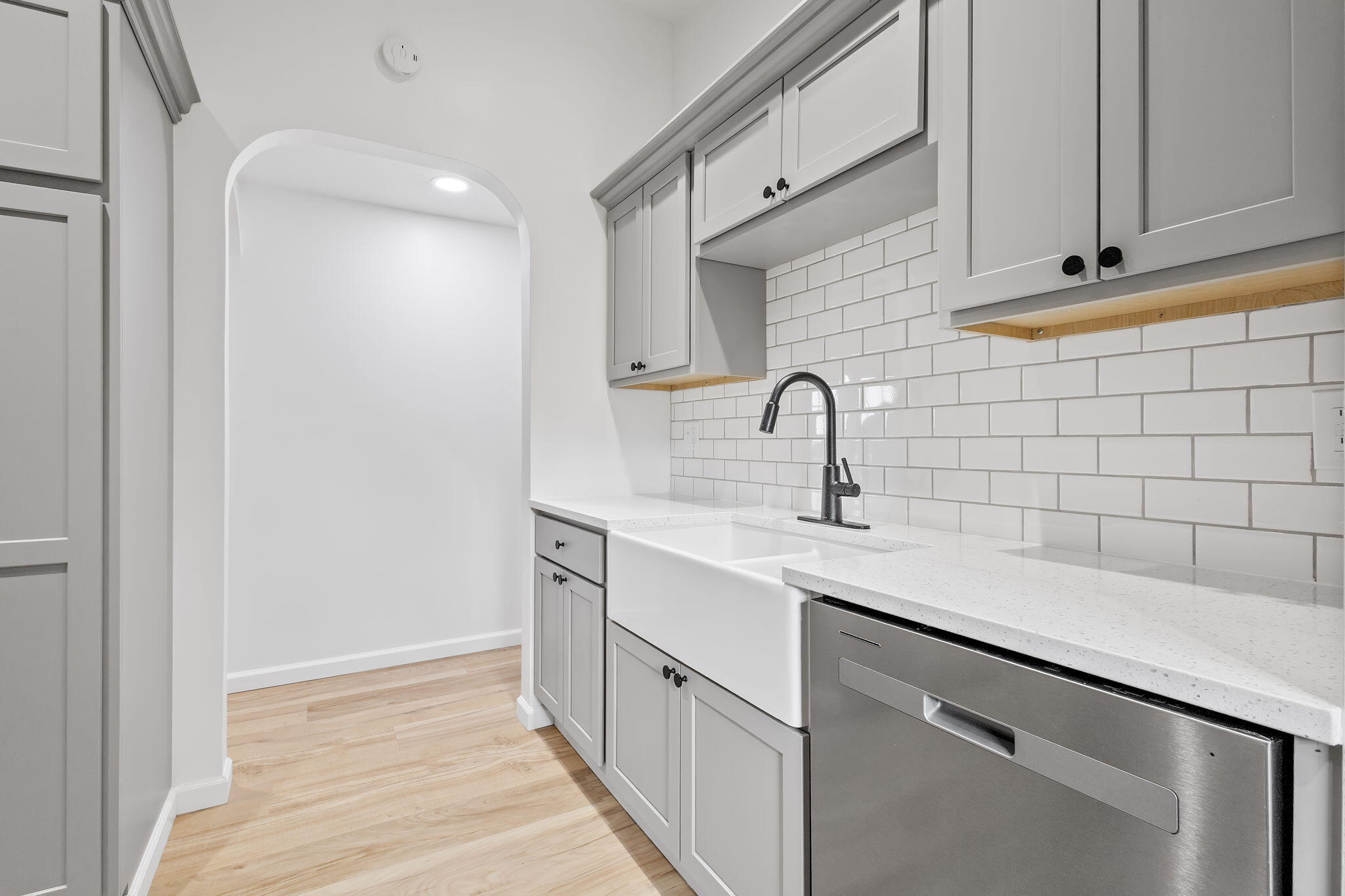 229 West Wood Road Rensselaer, IN 47978 - Photo 7 of 23 a kitchen with a sink and cabinets
