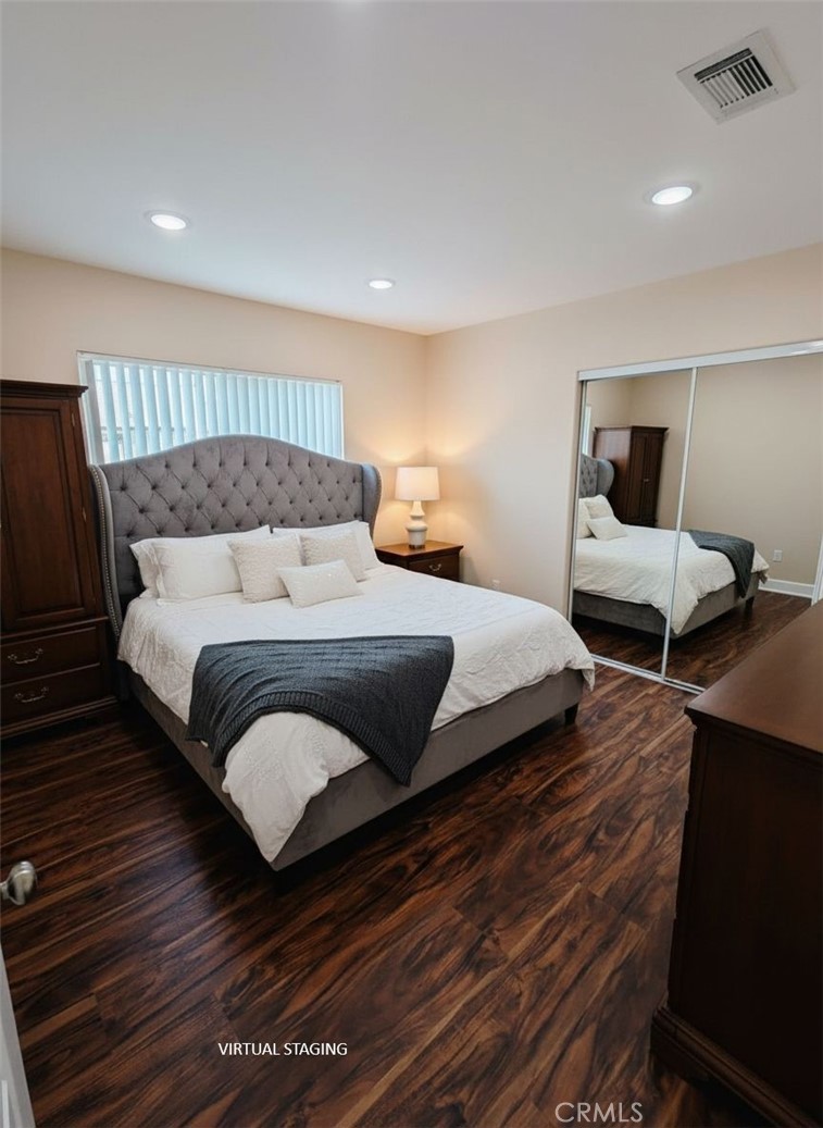 2523 Maynard Drive Duarte, CA 91010 - Photo 21 of 61 a bedroom with a bed and wooden floor