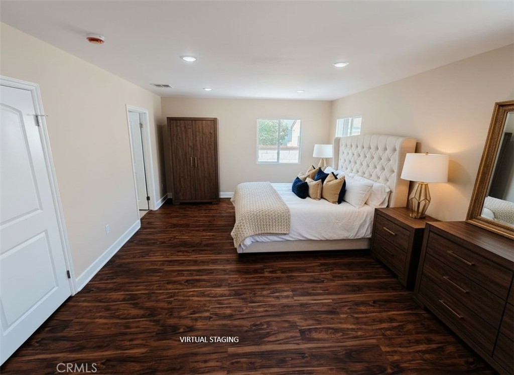 2523 Maynard Drive Duarte, CA 91010 - Photo 22 of 61 a bedroom with a bed and wooden floor