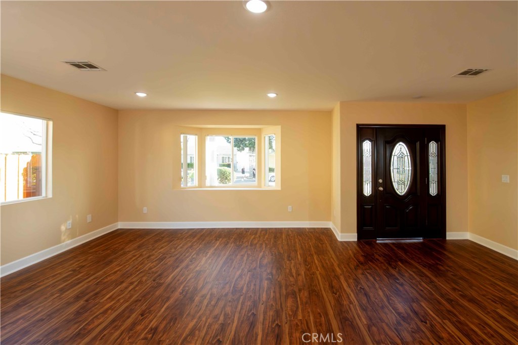2523 Maynard Drive Duarte, CA 91010 - Photo 23 of 61 a view of an empty room with wooden floor and a window