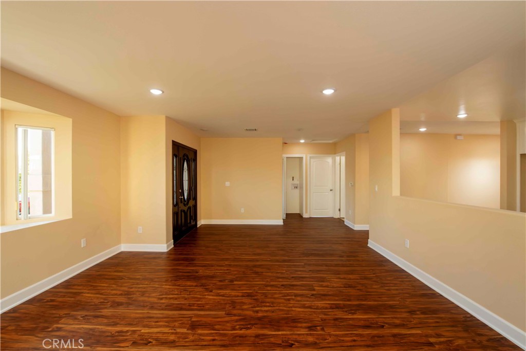 2523 Maynard Drive Duarte, CA 91010 - Photo 25 of 61 a view of an empty room with wooden floor and a window