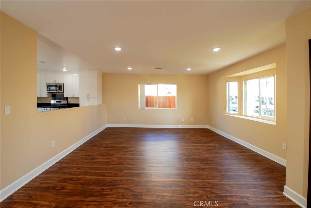 2523 Maynard Drive Duarte, CA 91010 - Photo 27 of 61 a view of an empty room with wooden floor and a window
