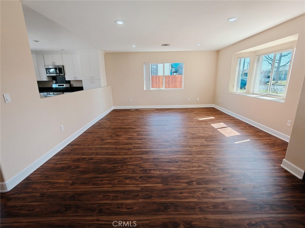 2523 Maynard Drive Duarte, CA 91010 - Photo 29 of 61 a view of an empty room with wooden floor and a window