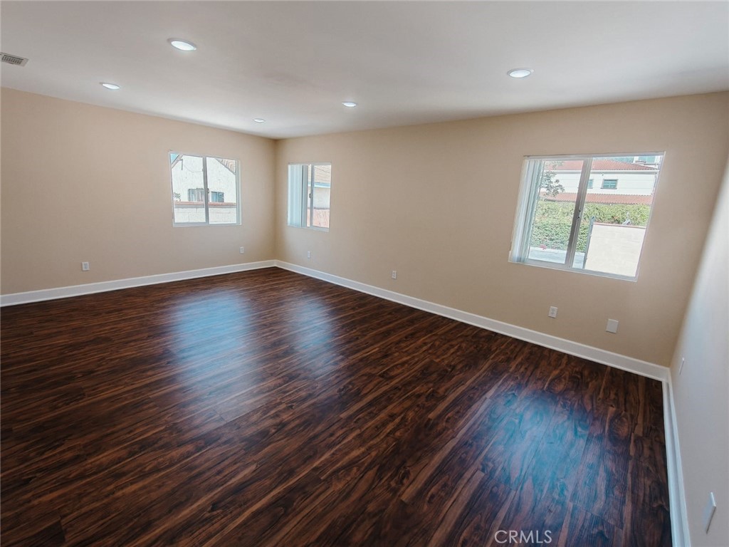 2523 Maynard Drive Duarte, CA 91010 - Photo 31 of 61 an empty room with wooden floor and windows