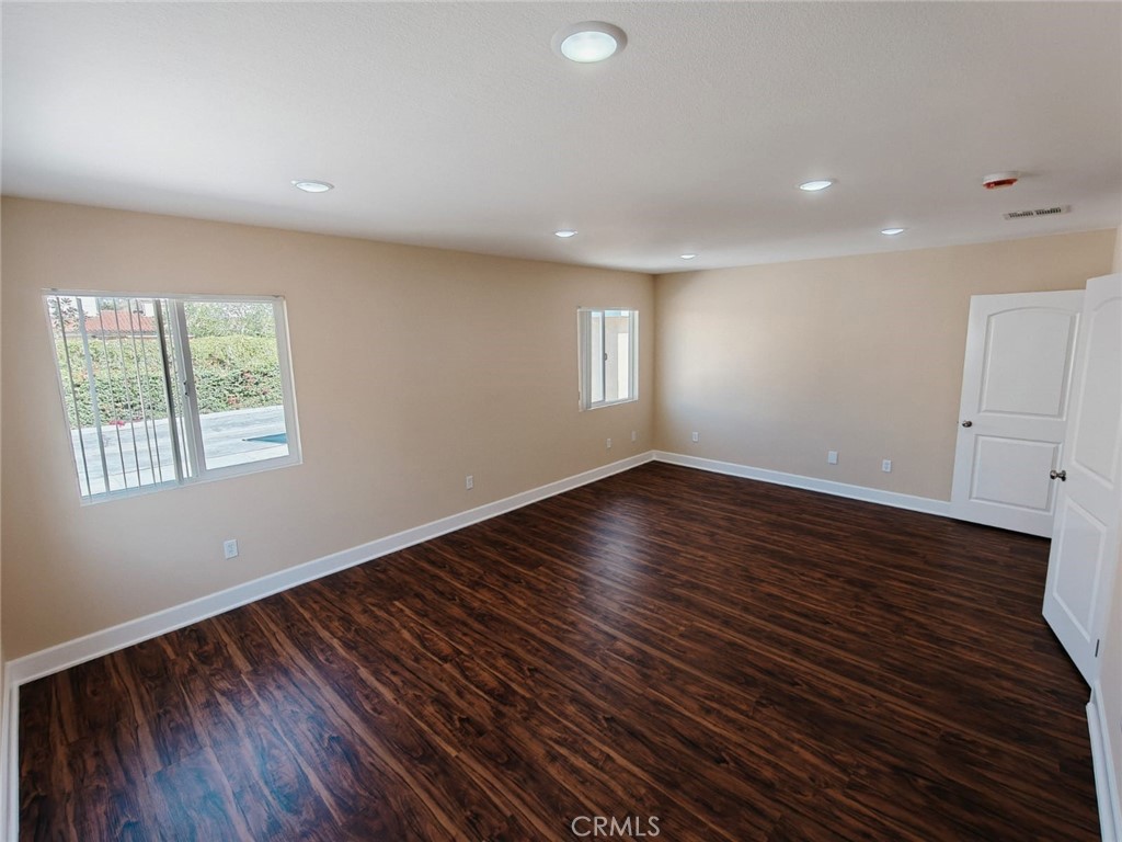 2523 Maynard Drive Duarte, CA 91010 - Photo 33 of 61 an empty room with wooden floor and windows