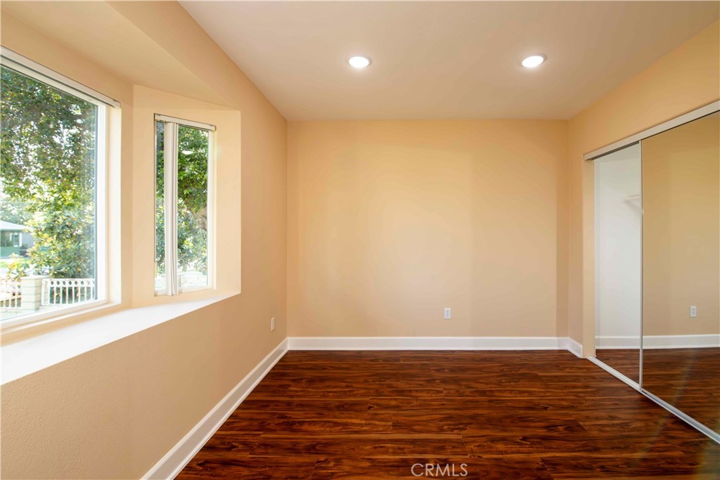 2523 Maynard Drive Duarte, CA 91010 - Photo 38 of 61 a view of an empty room with wooden floor and a window