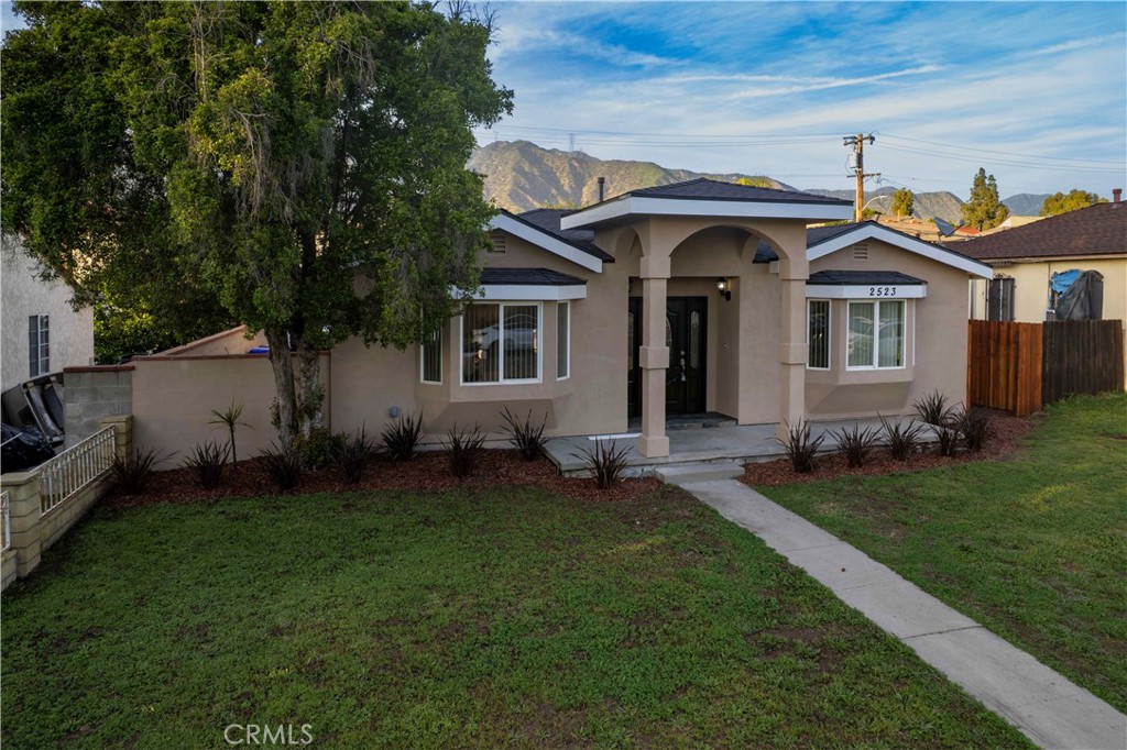 2523 Maynard Drive Duarte, CA 91010 - Photo 5 of 61 a front view of a house with a garden