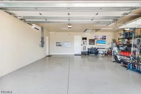 a view of storage and utility room with racks on the wall