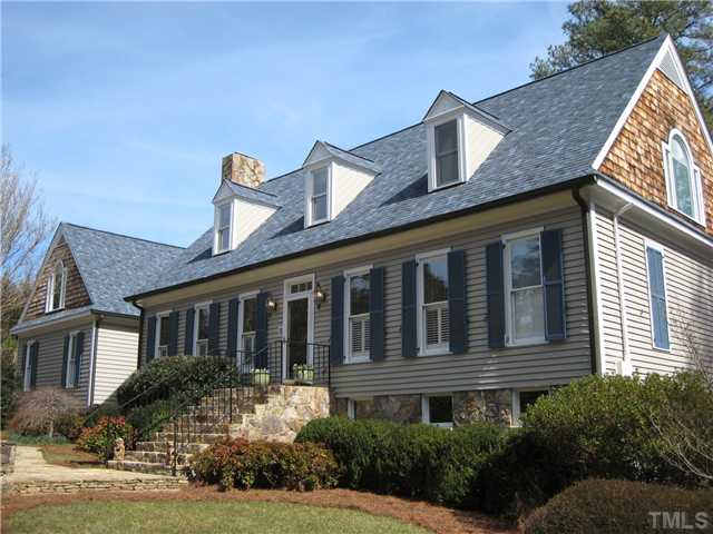 501 Pendleton Lake Road Raleigh, NC 27614 - Photo 1 of 23 a front view of a house with garden
