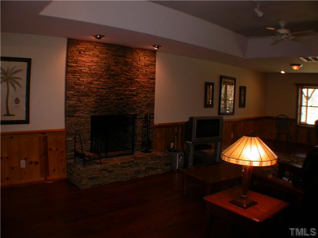 501 Pendleton Lake Road Raleigh, NC 27614 - Photo 17 of 23 a room with furniture and a fireplace