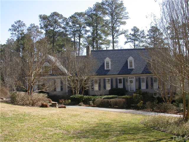501 Pendleton Lake Road Raleigh, NC 27614 - Photo 20 of 23 a view of a house next to a yard with a large tree