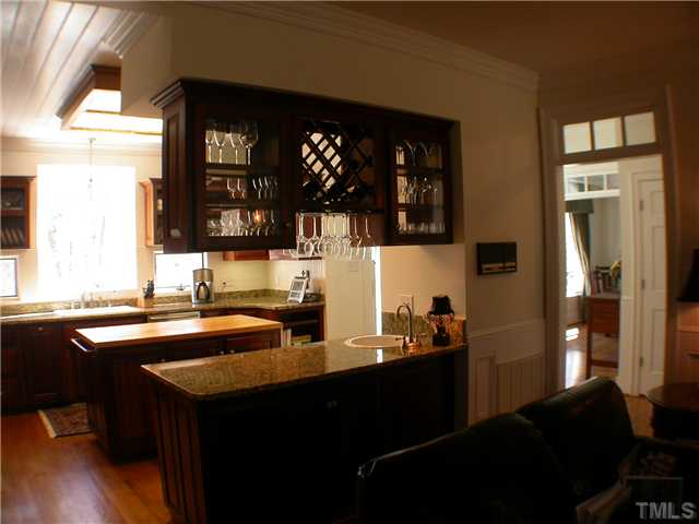 501 Pendleton Lake Road Raleigh, NC 27614 - Photo 5 of 23 a kitchen with a sink and cabinets