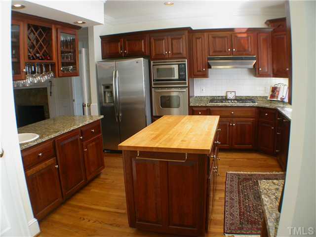 501 Pendleton Lake Road Raleigh, NC 27614 - Photo 6 of 23 a kitchen with stainless steel appliances granite countertop a refrigerator and a stove
