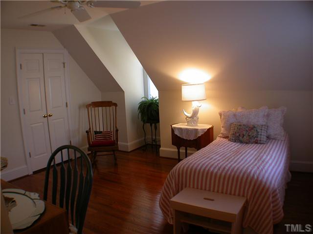 501 Pendleton Lake Road Raleigh, NC 27614 - Photo 10 of 23 a bedroom with two beds and a table