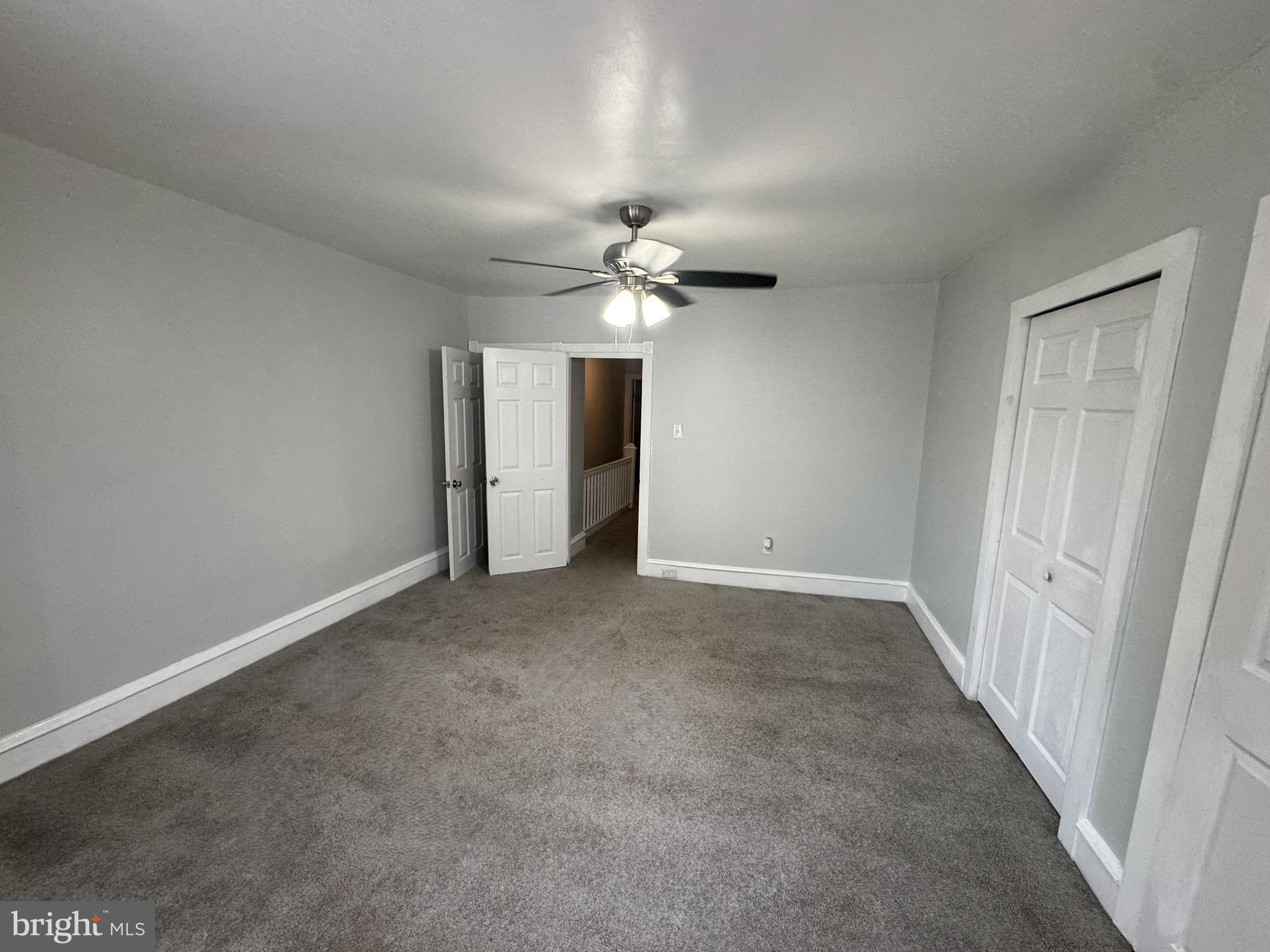 5502 Crowson Street Philadelphia, PA 19144 - Photo 8 of 16 a view of a chandelier fan in big room