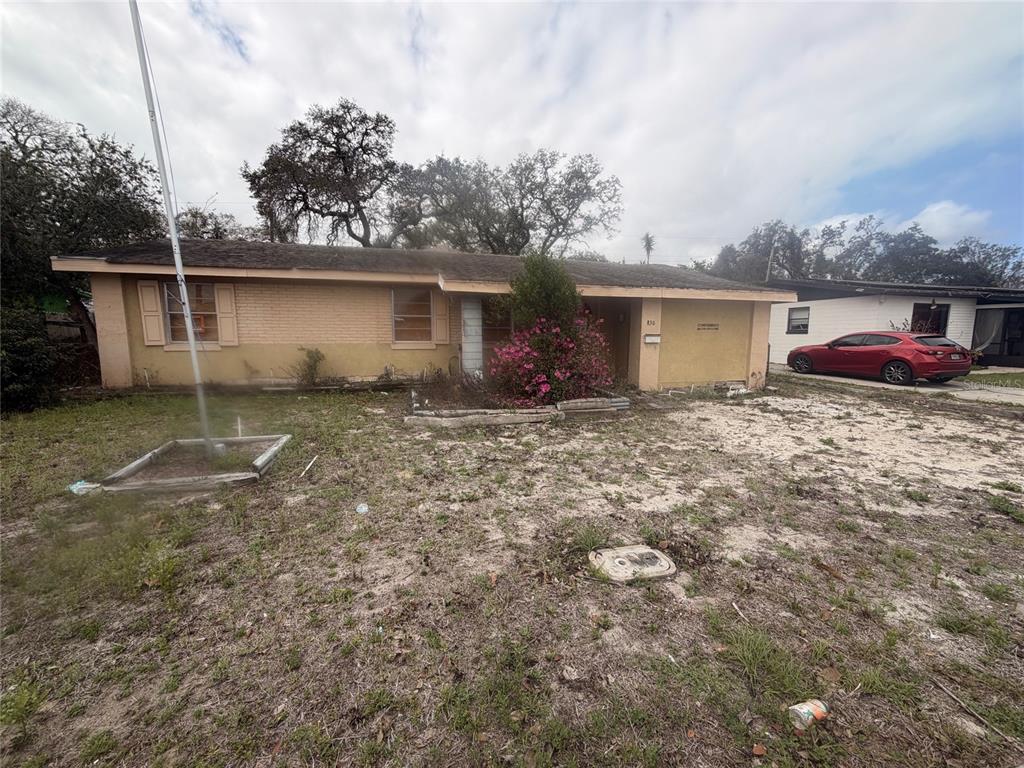 830 Berkshire Road Daytona Beach, FL 32117 - Photo 1 of 9 a house view with a outdoor space