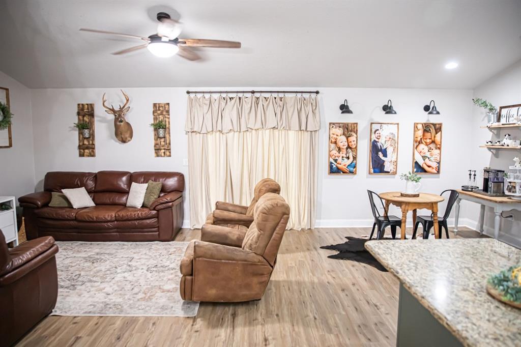 1533 County Road 13 Bunnell, FL 32110 - Photo 15 of 49 a living room with furniture and a large window