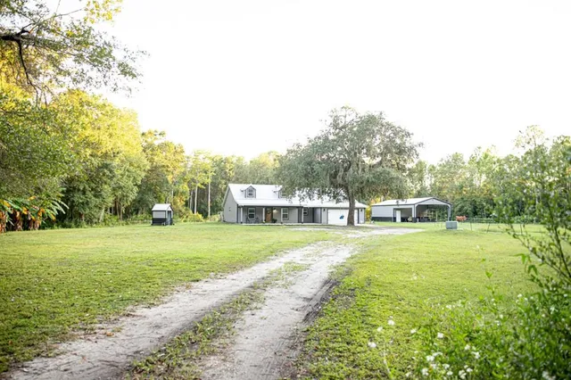 a house view with a outdoor space