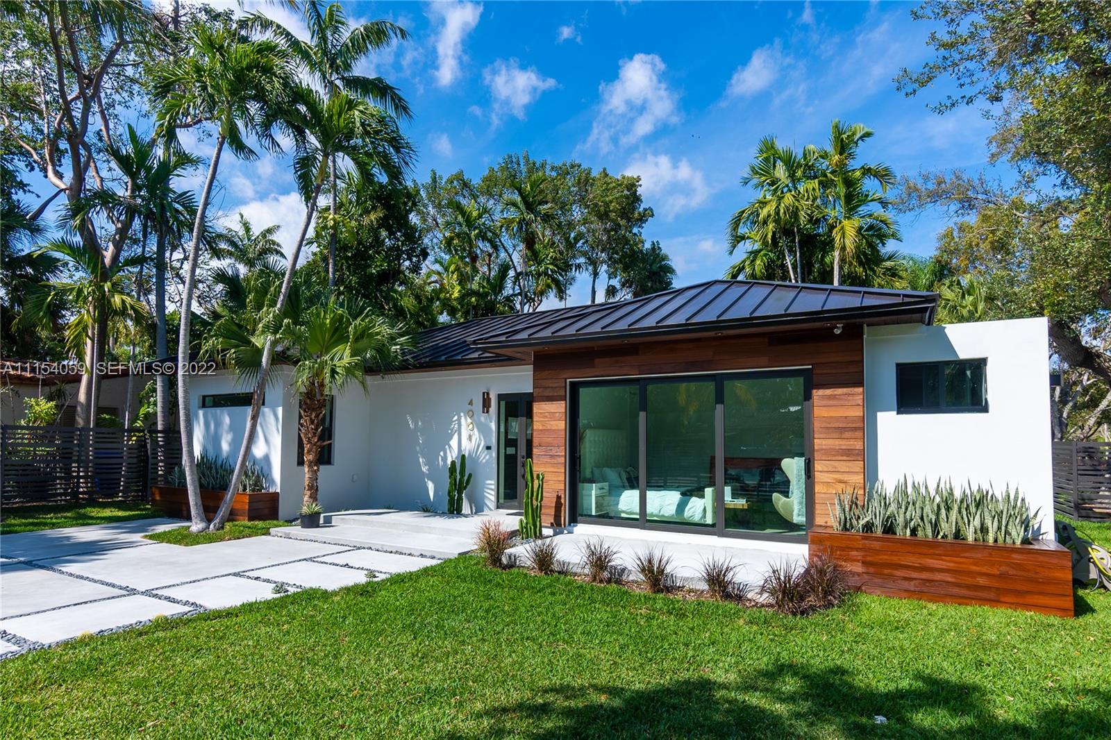 4001 Woodridge Road Miami, FL 33133 - Photo 2 of 15 Exterior Front