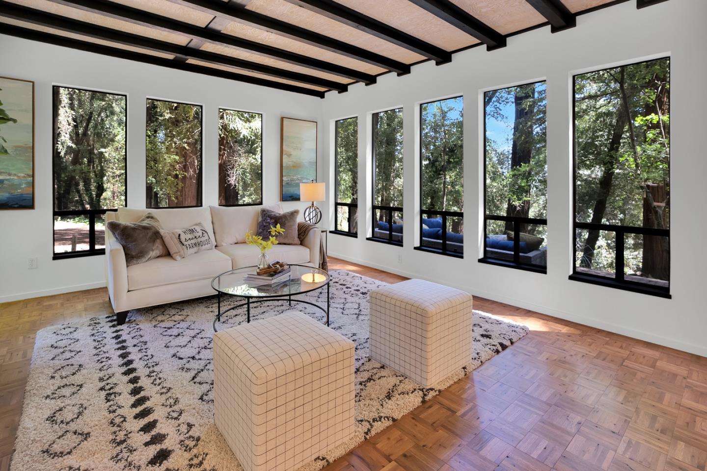 22540 Echo Drive Los Gatos, CA 95033 - Photo 7 of 41 a living room with furniture and large windows with garden view