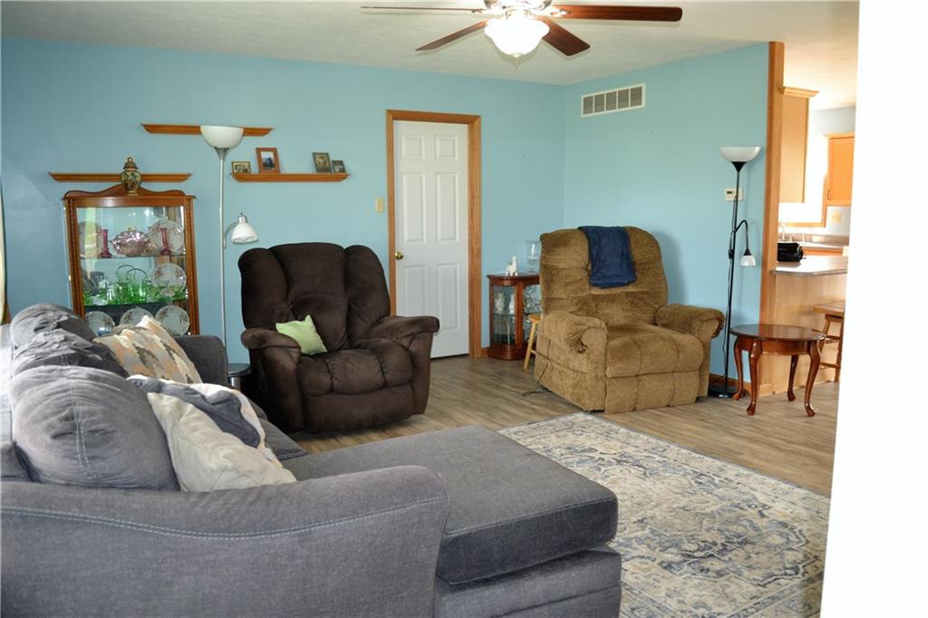 192 Elderton Heights Road Elderton, PA 15736 - Photo 2 of 20 Living room opens to dining room and kitchen. New LVP flooring