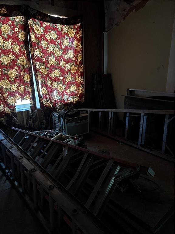 2803 Grafton Avenue Dallas, TX 75211 - Photo 4 of 5 a living room with wooden floor and a table