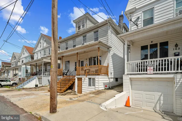 a view of a building with a bench