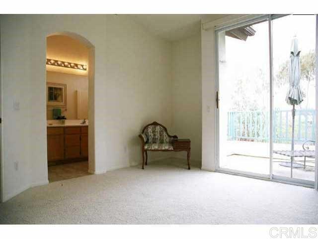 442 Carmel Creeper Place Encinitas, CA 92024 - Photo 5 of 12 a view of an empty room and a window