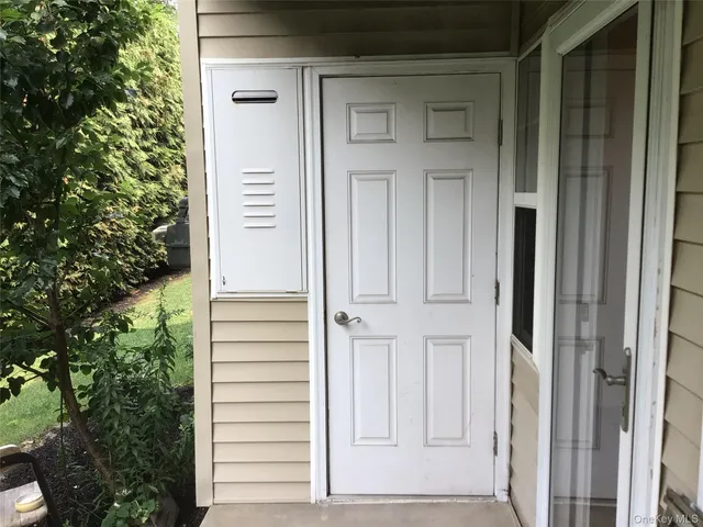 a view of swimming pool with outdoor seating and yard
