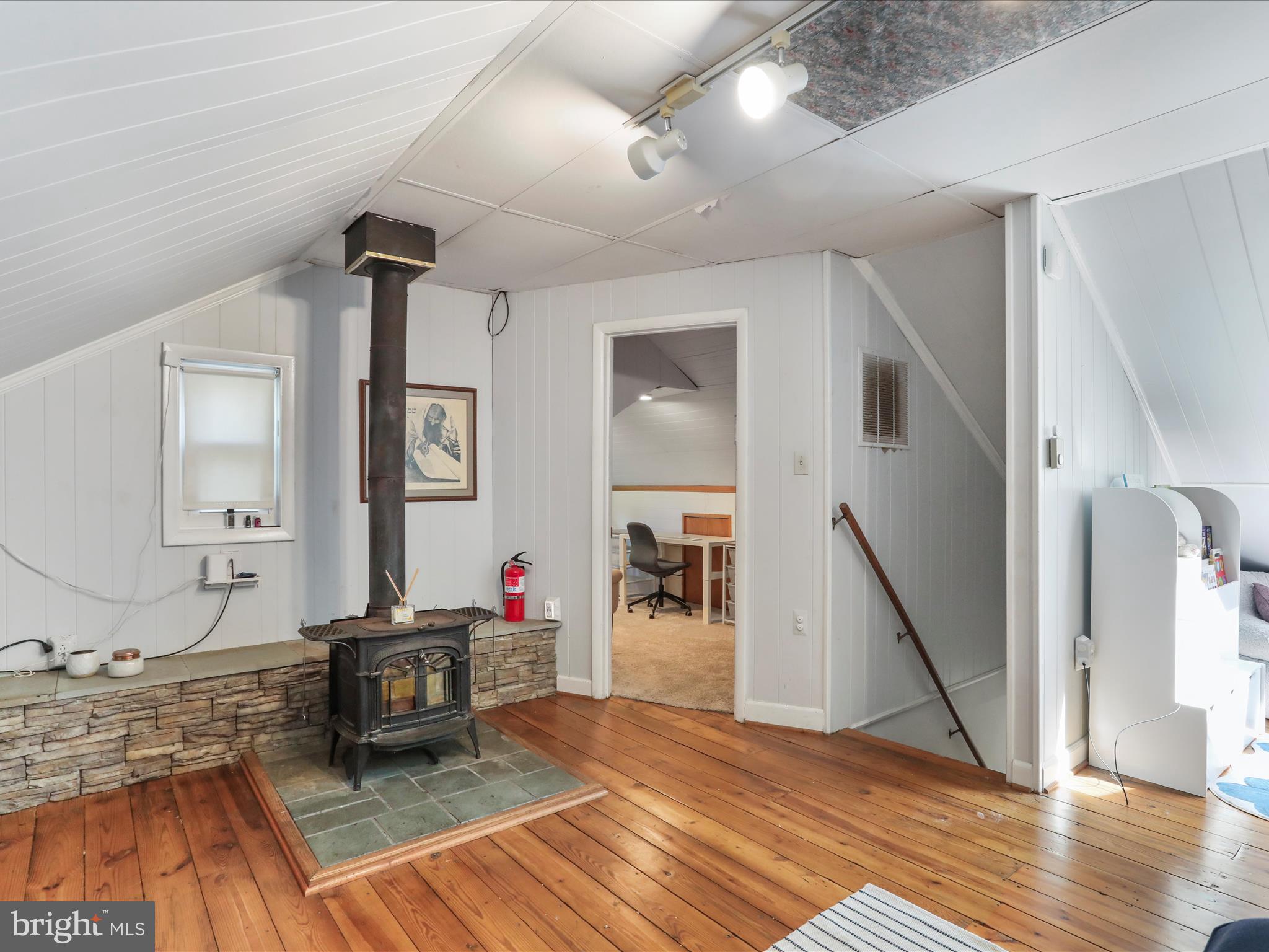6927 Kellys Store Road Thurmont, MD 21788 - Photo 12 of 42 a living room with furniture and a wooden floor