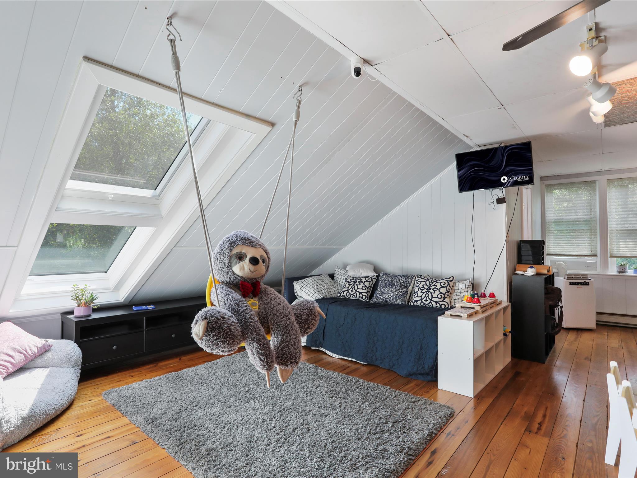6927 Kellys Store Road Thurmont, MD 21788 - Photo 13 of 42 a living room filled with furniture and wooden floor