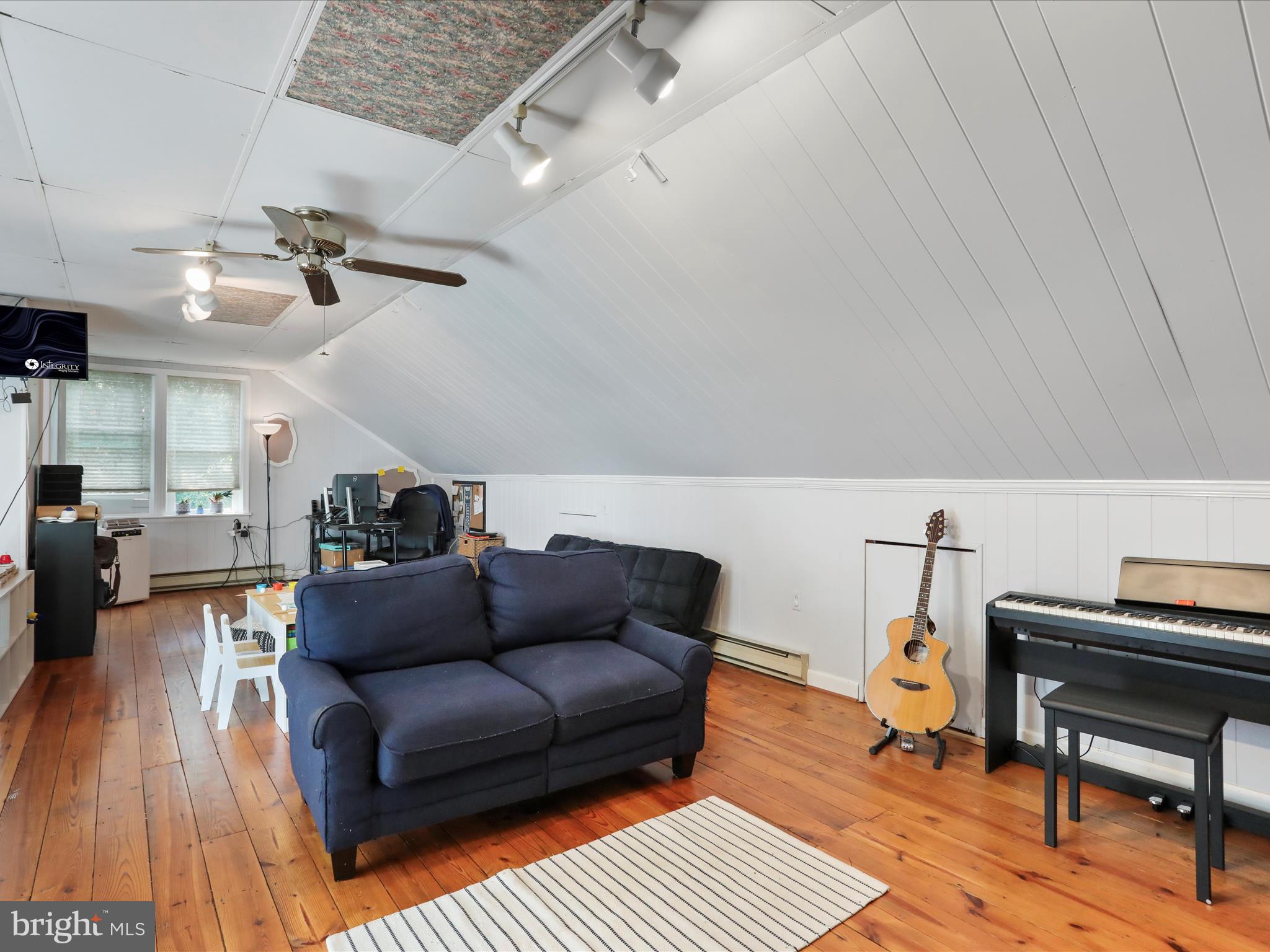 6927 Kellys Store Road Thurmont, MD 21788 - Photo 14 of 42 a living room with furniture and wooden floor