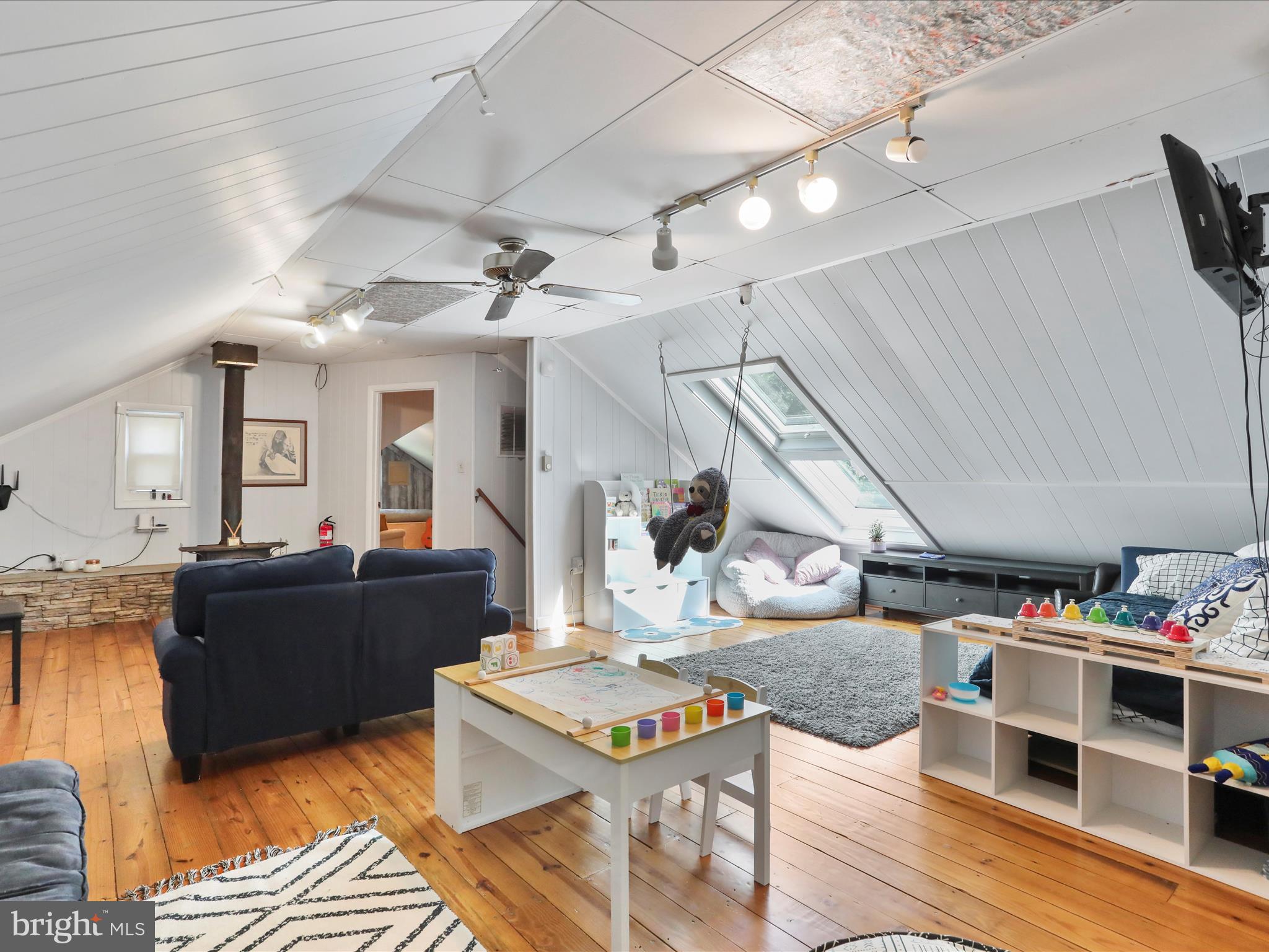 6927 Kellys Store Road Thurmont, MD 21788 - Photo 15 of 42 a living room with furniture and a wooden floor