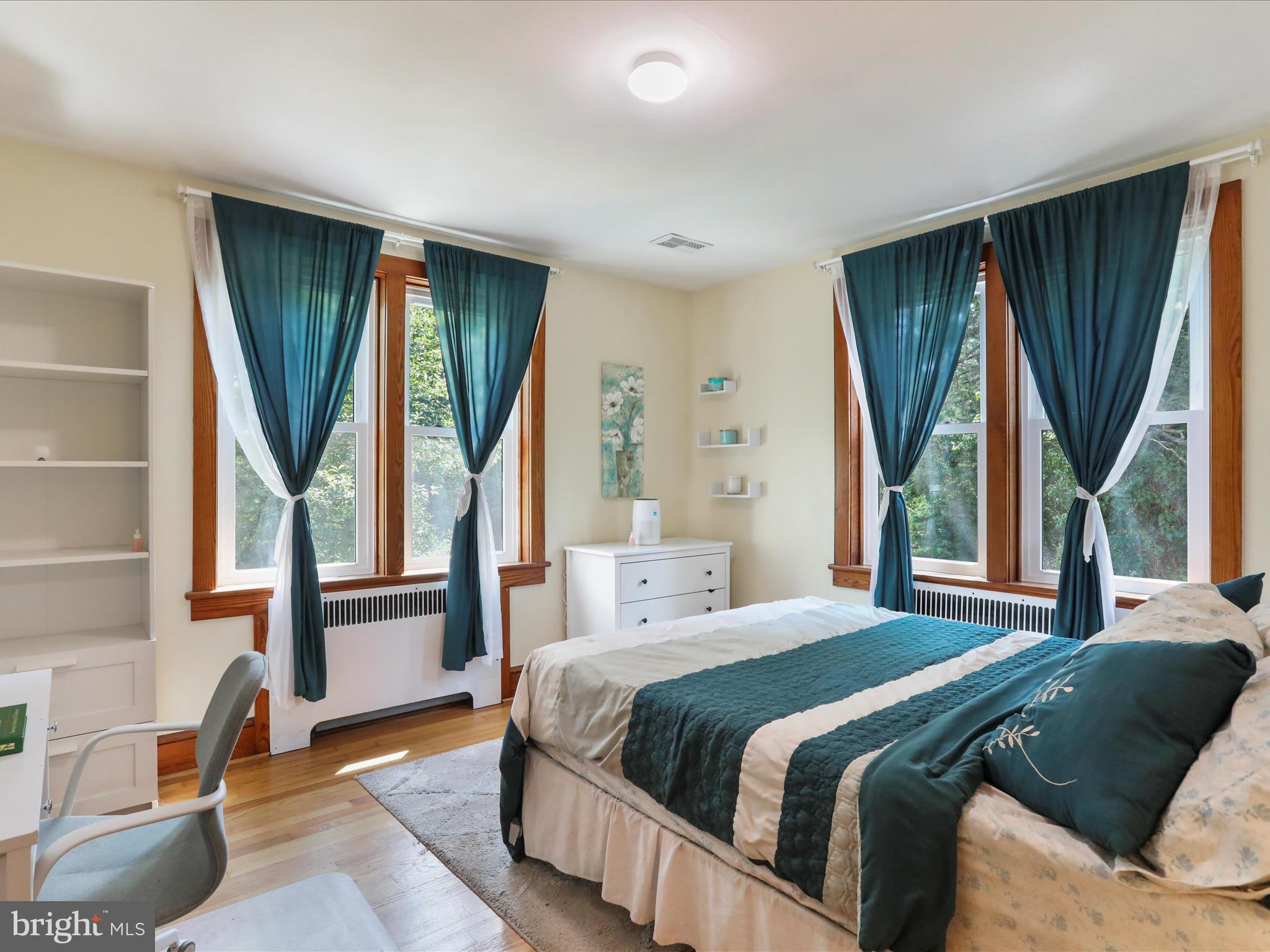 6927 Kellys Store Road Thurmont, MD 21788 - Photo 18 of 42 a bedroom with a bed and a window