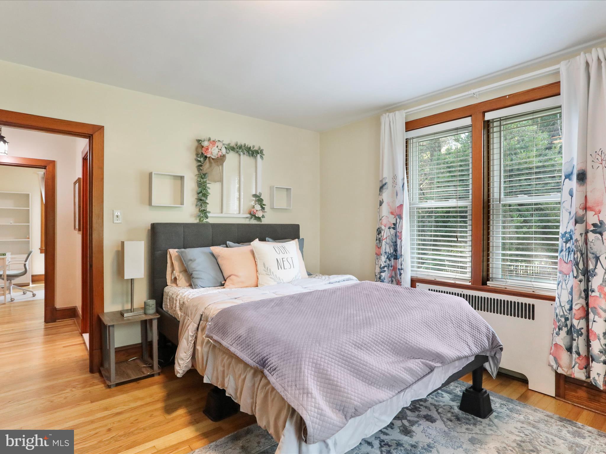 6927 Kellys Store Road Thurmont, MD 21788 - Photo 20 of 42 a bedroom with a bed and wooden floor