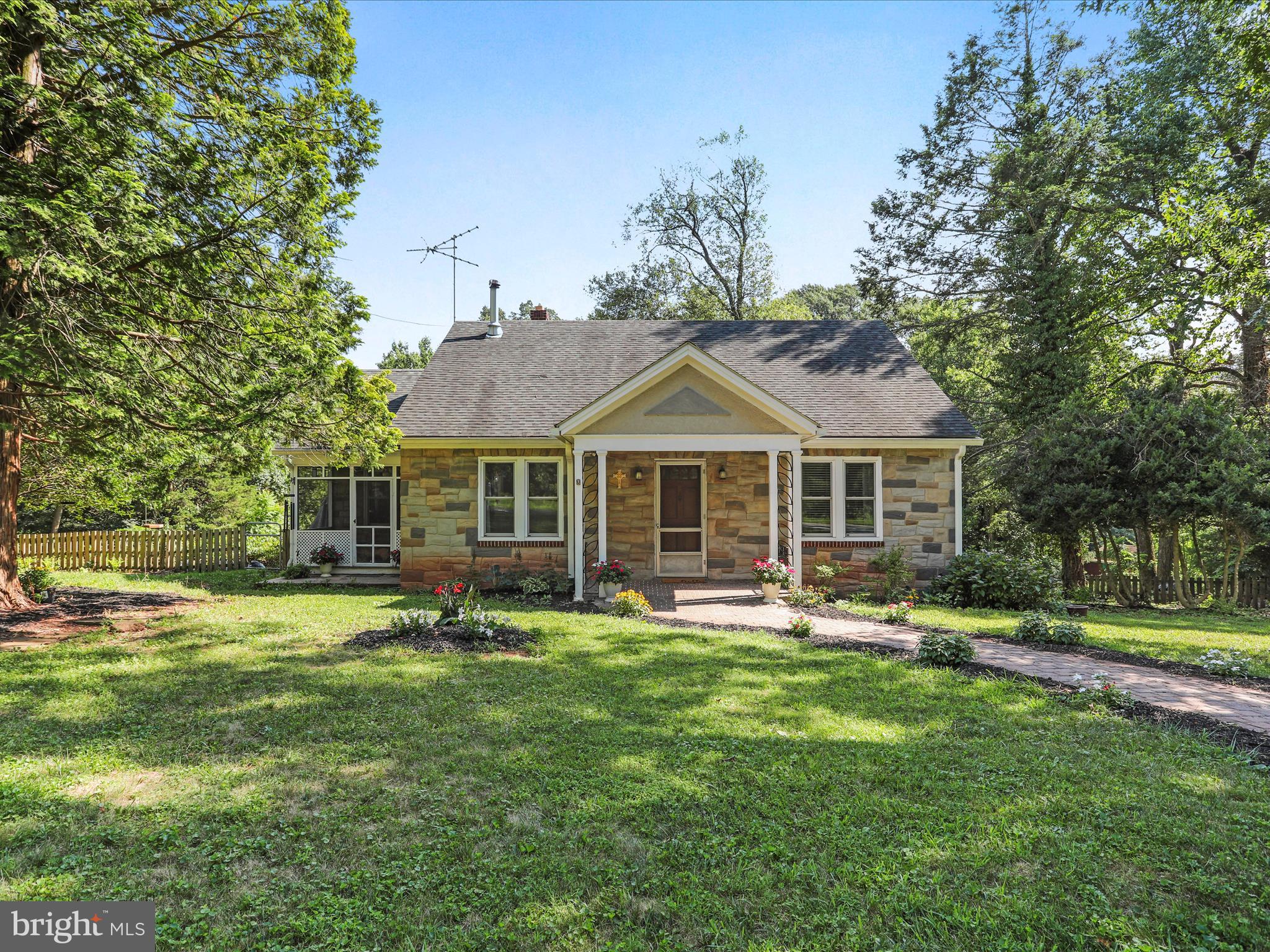 6927 Kellys Store Road Thurmont, MD 21788 - Photo 2 of 42 a front view of house with yard and green space