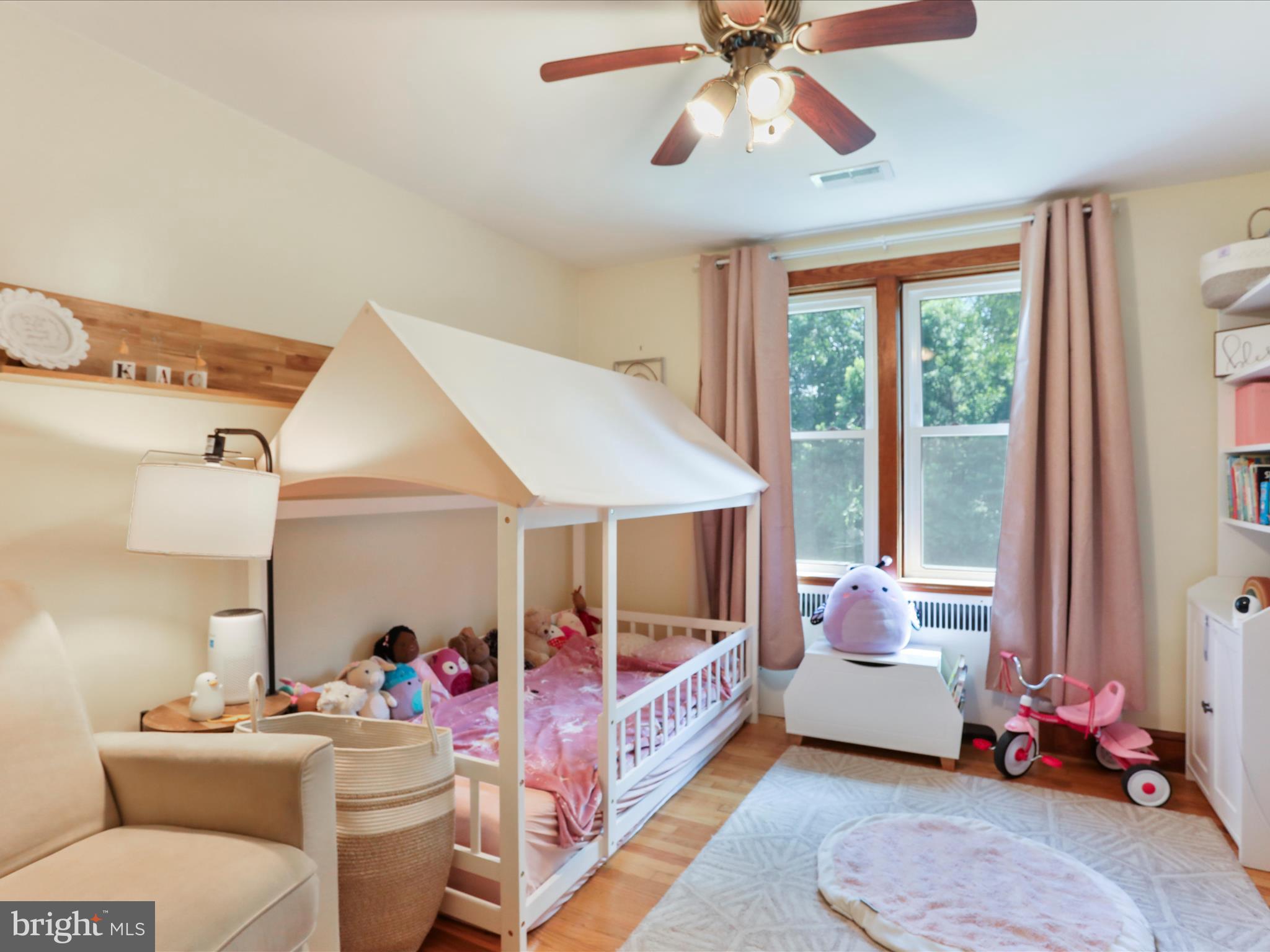 6927 Kellys Store Road Thurmont, MD 21788 - Photo 23 of 42 a bedroom with furniture and a large window