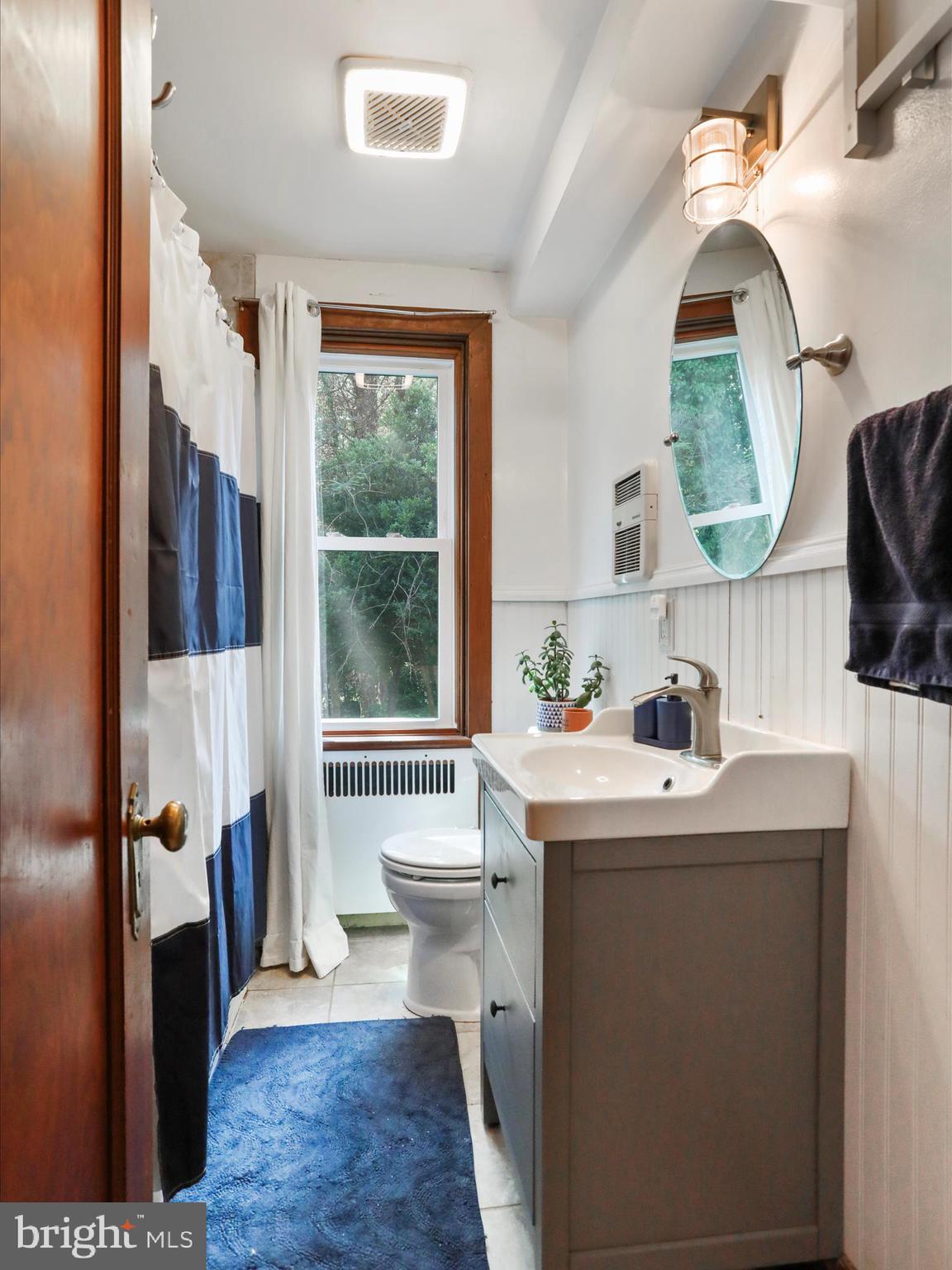 6927 Kellys Store Road Thurmont, MD 21788 - Photo 25 of 42 a living room with a sink furniture and a window