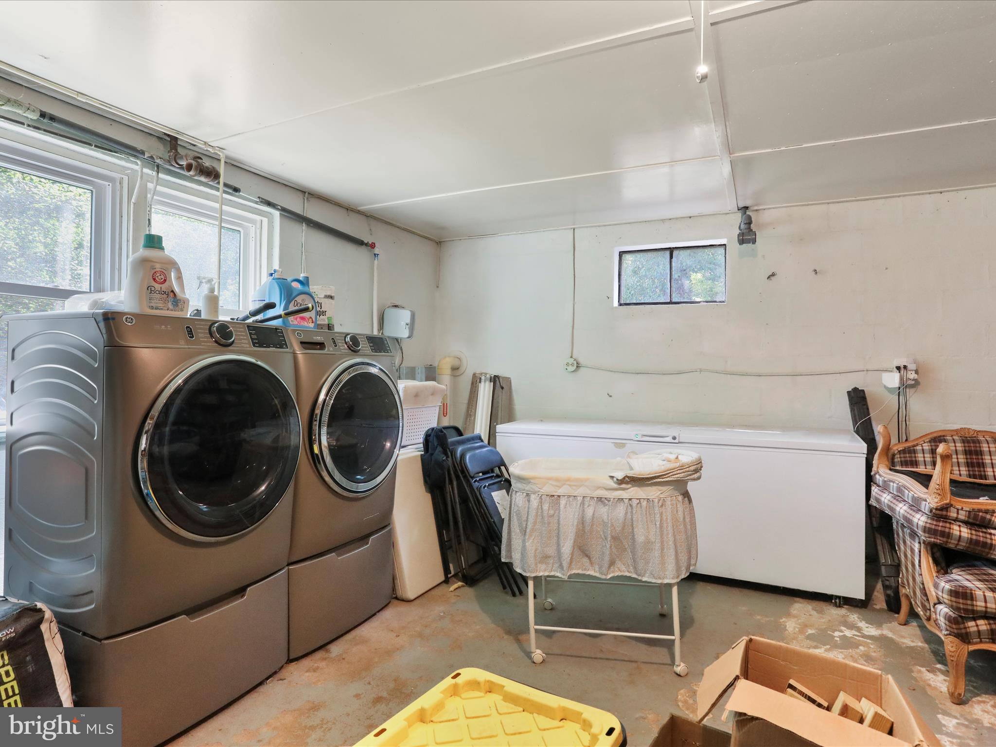 6927 Kellys Store Road Thurmont, MD 21788 - Photo 29 of 42 a utility room with cabinets dryer and washer