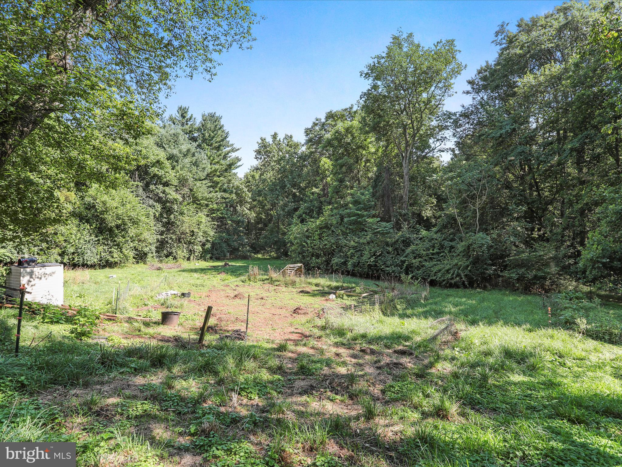 6927 Kellys Store Road Thurmont, MD 21788 - Photo 34 of 42 a view of a lake with a yard