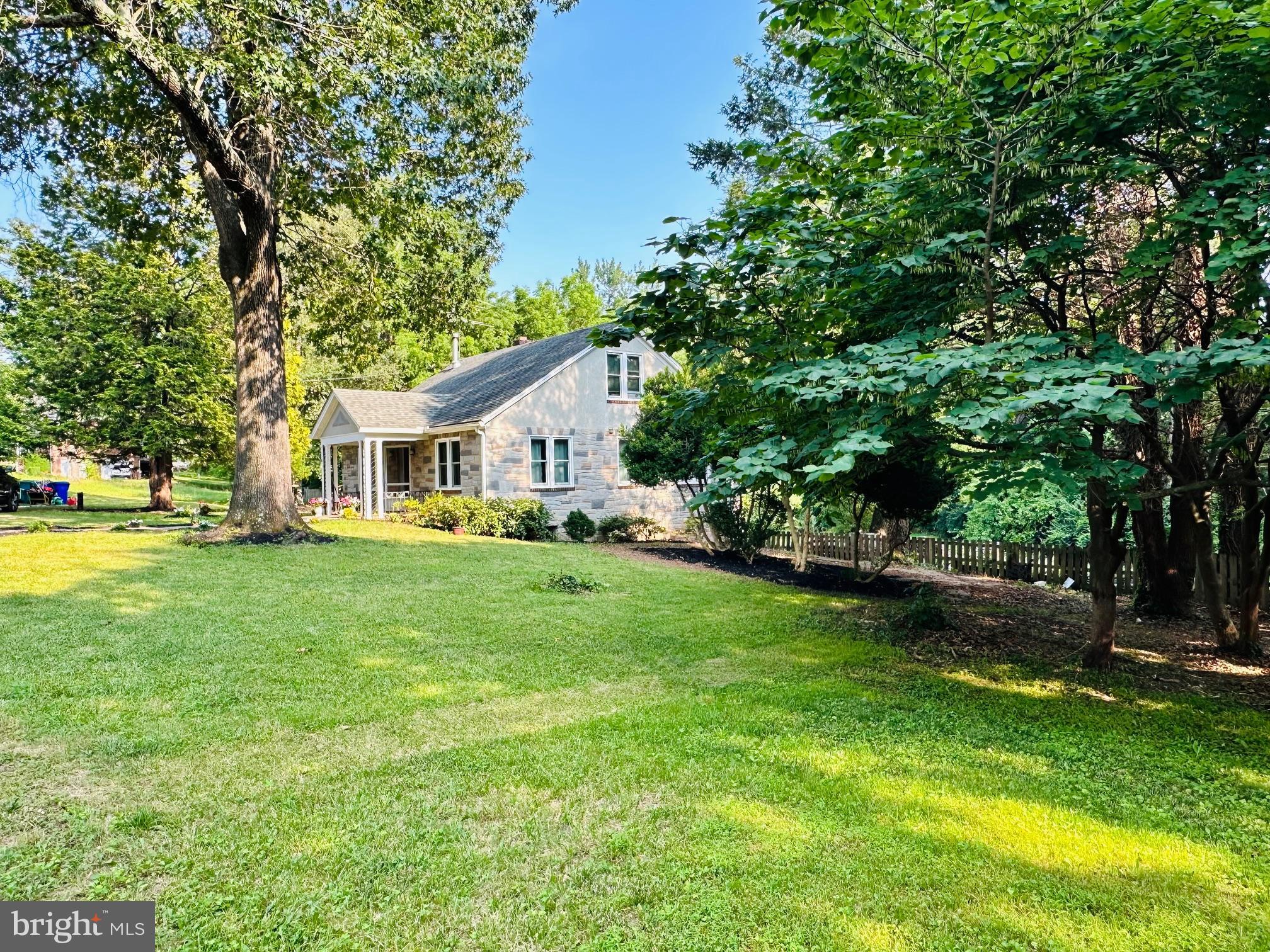 6927 Kellys Store Road Thurmont, MD 21788 - Photo 36 of 42 a front view of a house with garden