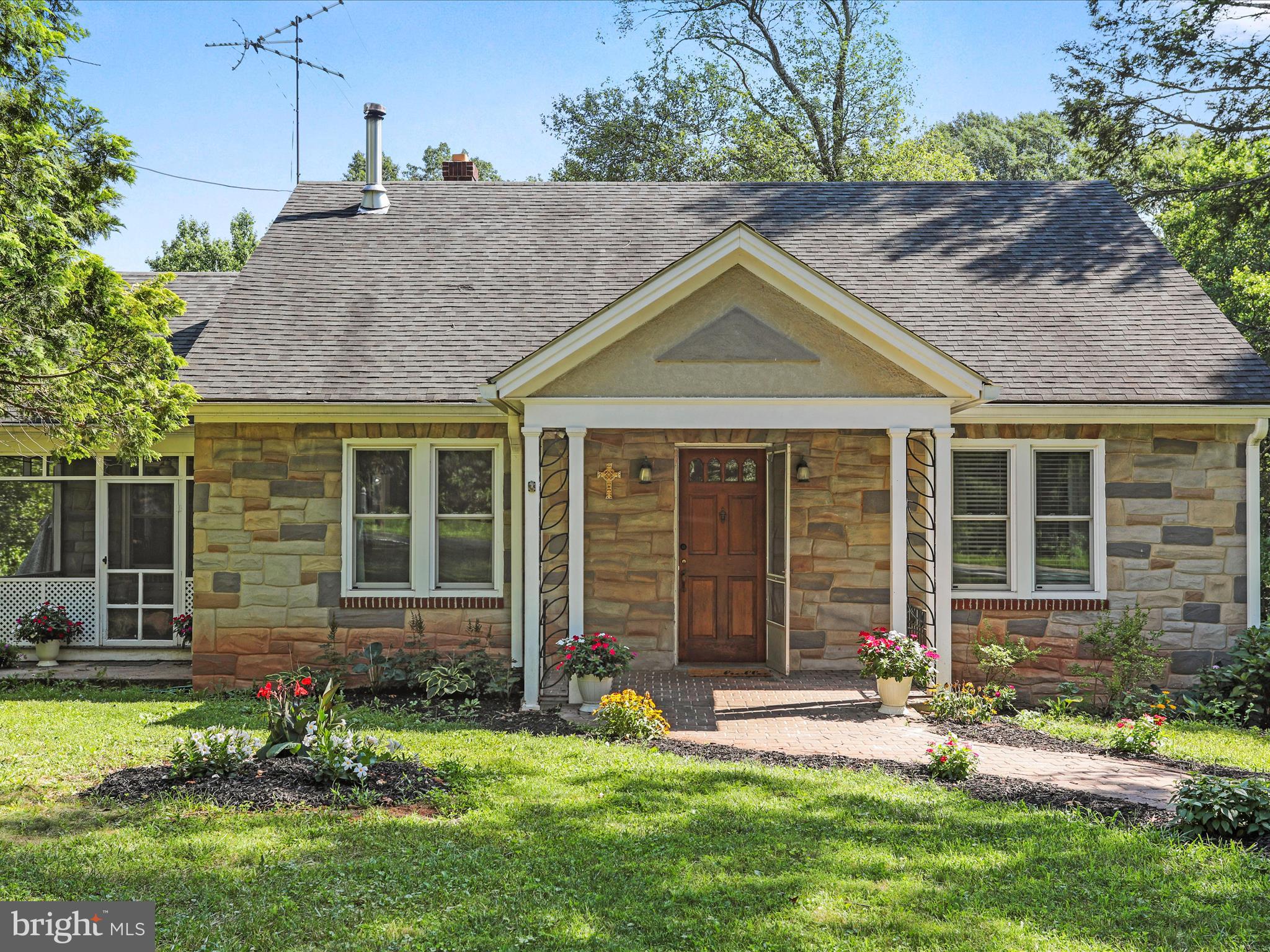 6927 Kellys Store Road Thurmont, MD 21788 - Photo 39 of 42 a front view of a house with a yard and outdoor seating