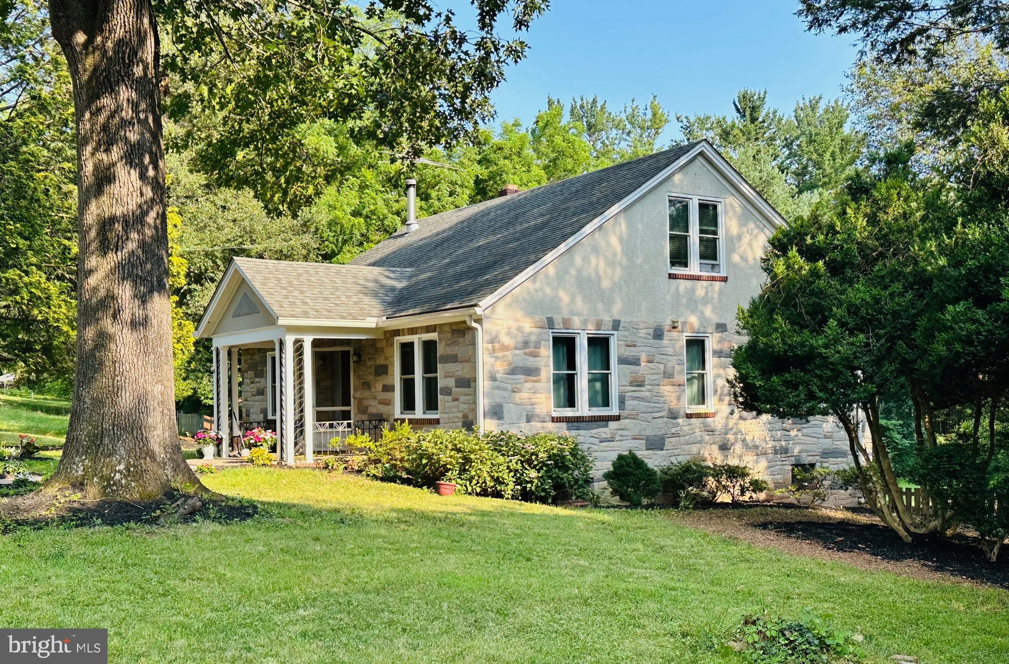 6927 Kellys Store Road Thurmont, MD 21788 - Photo 41 of 42 a view of a house with backyard and garden