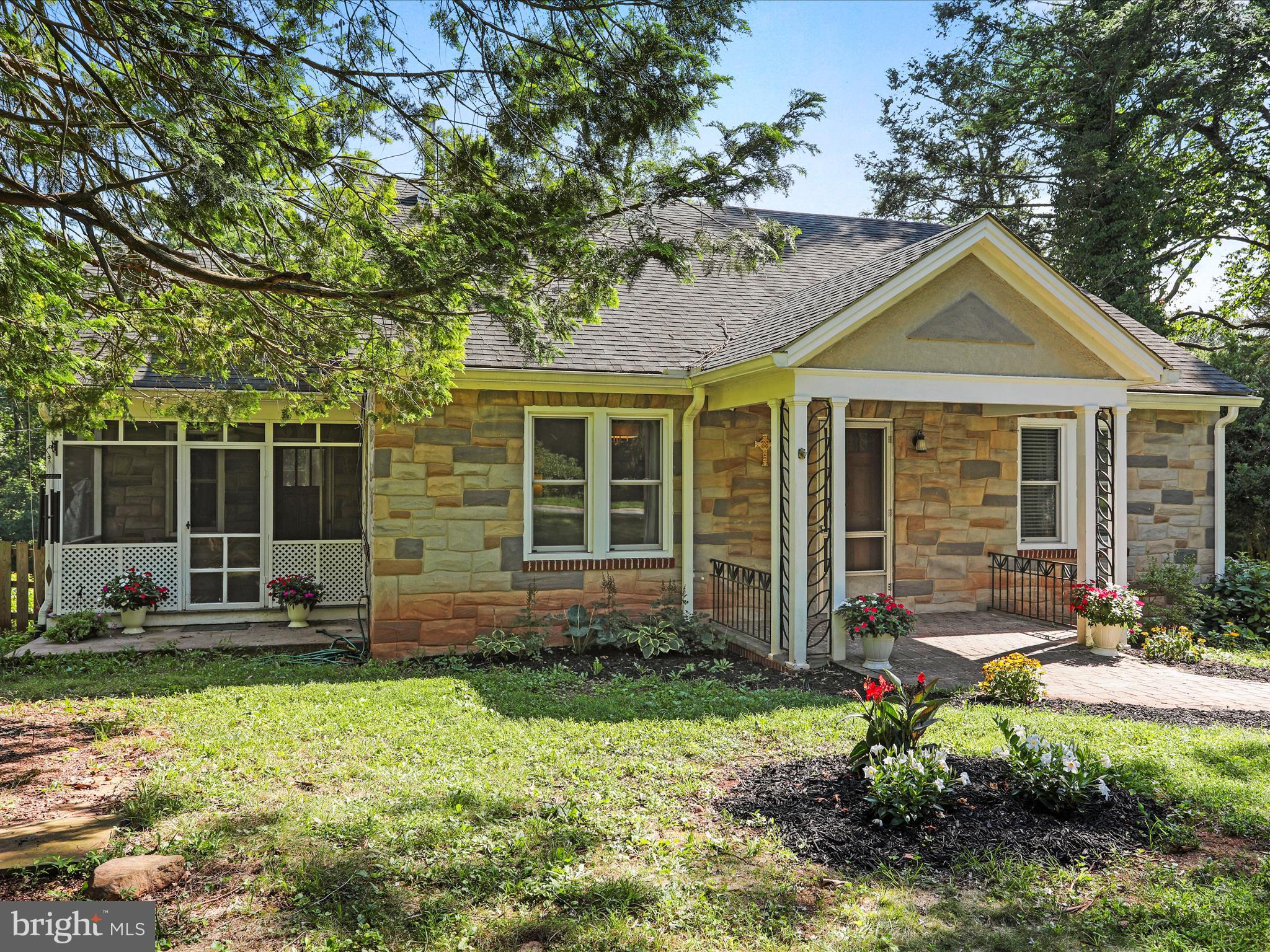 6927 Kellys Store Road Thurmont, MD 21788 - Photo 42 of 42 a front view of a house with garden
